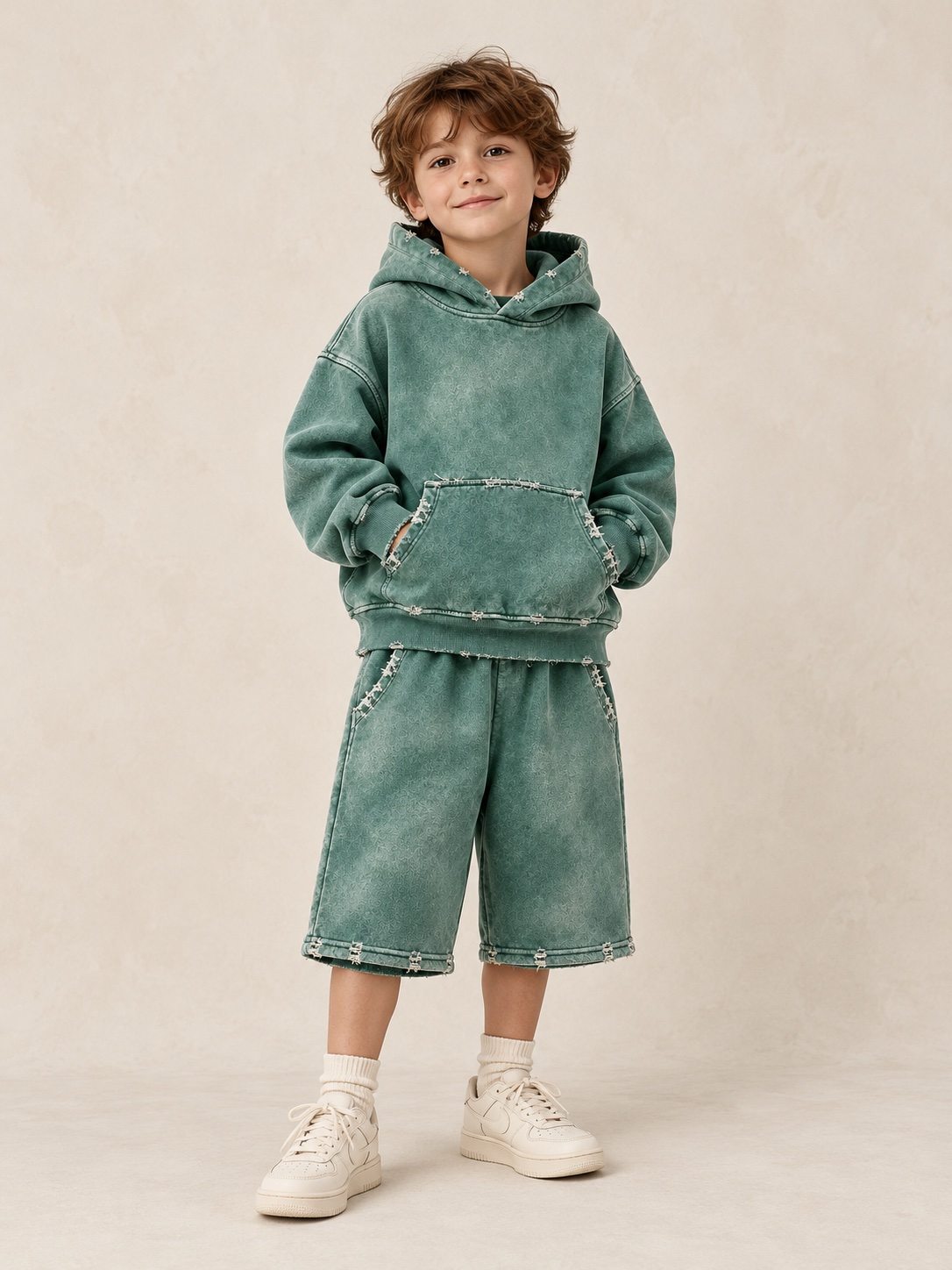 AI model wearing the Patina hoodie and matching three-quarter shorts